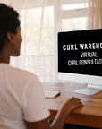 Person using a computer with 'Curl Warehouse Virtual Curl Consultations' on the screen at a desk.